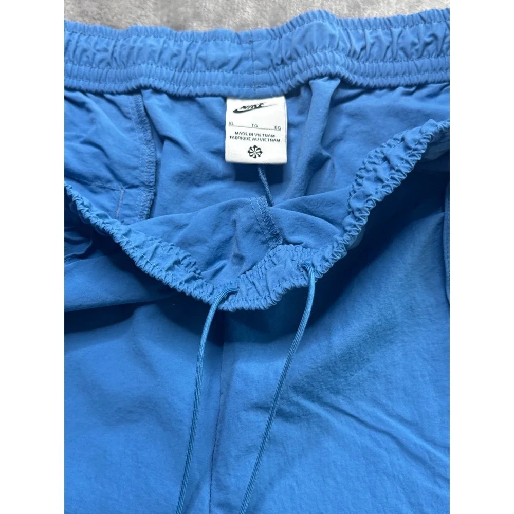 Nike Womens XL Everything Wovens Mid Rise Pants Star Blue Open Hem Baggy